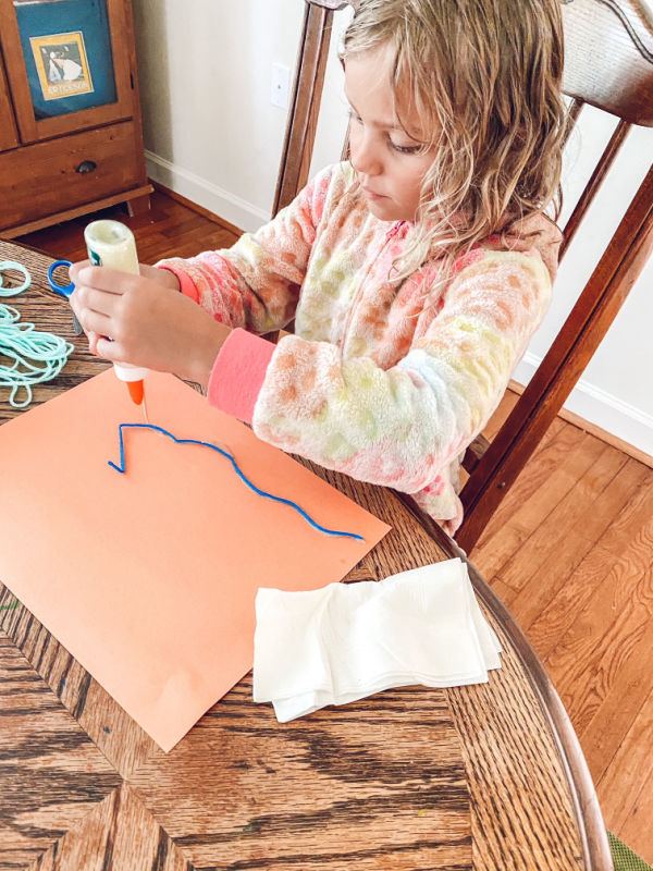 Yarn pictures art activity great for summer indoor fun or art on a rainy day.