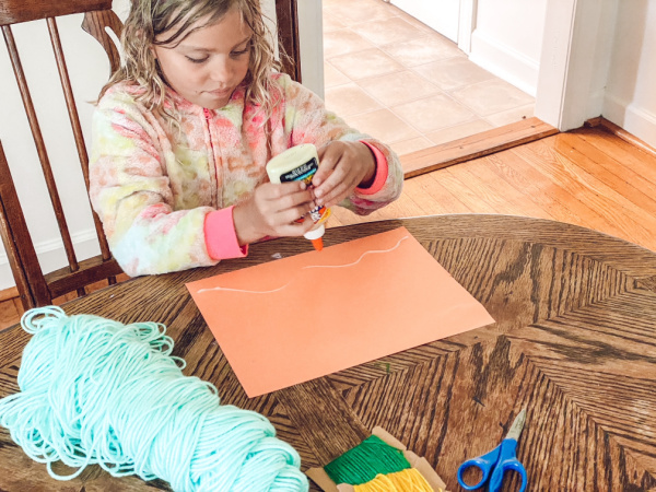 Children can do these art activities with yarn indoors or outside on a nice day.
