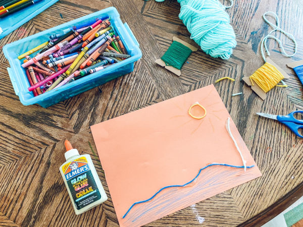 Supplies you need to do this yarn pictures art activity for kids at home.