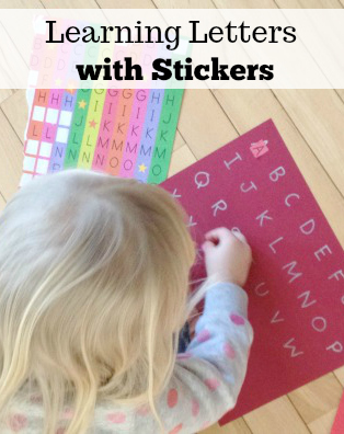 Learning letters and shapes with stickers preschool activity at home.