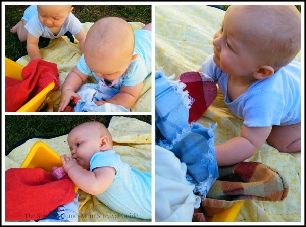 Babies play with a simple infants sensory activity using cloth napkins or fabric scraps PLUS a little surprise for the senses!