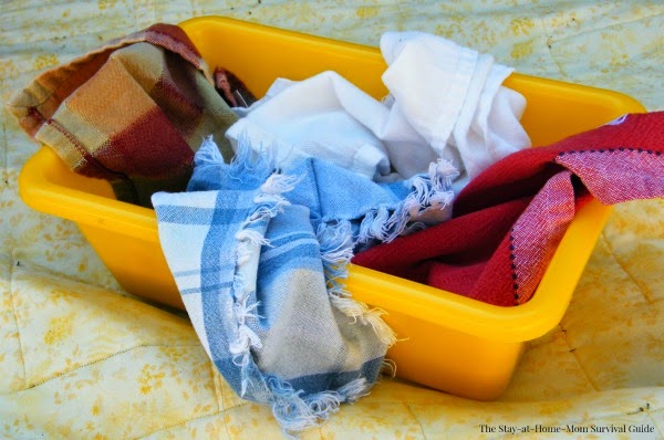 Napkin or fabric scrap sensory bin for babies is so easy to set up and there are great tips for taking baby outdoors!
