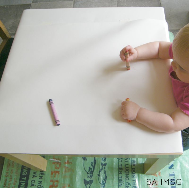 Writing activities for toddlers: simple invitation to color with crayons.