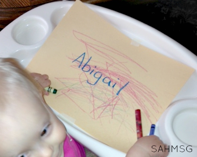 Simple writing activity for toddlers that teaches how to spell their name.
