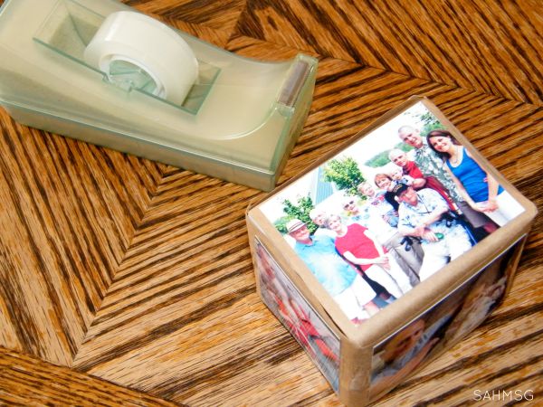 DIY photo blocks with family photos to add interest to play for infants and toddlers.