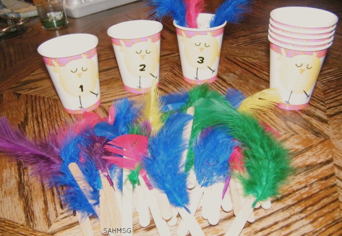 Chick feather counting cups-preschool counting activity with an Easter and Spring theme all made with supplies from the dollar aisle.