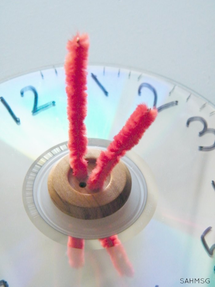 Common Core Math Games with hands-on math manipulative clock.