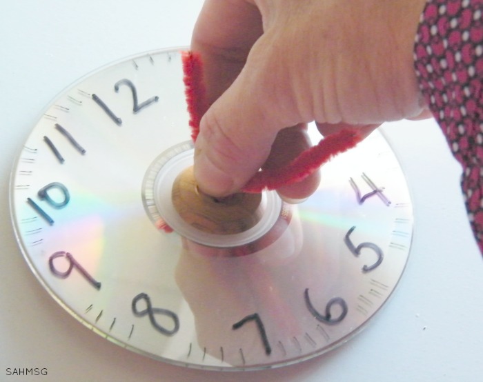 Common Core Math Games with hands-on math manipulative clock.