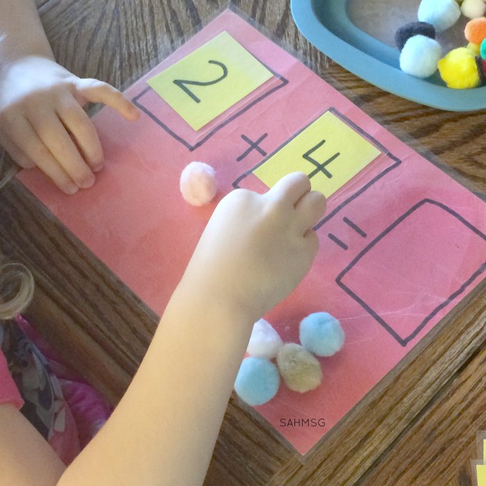Explore addition with a hands-on addition busy bag for practicing addition concepts, counting and number identification for children in kindergarten or as young as preschool. Adaptations included for younger children.