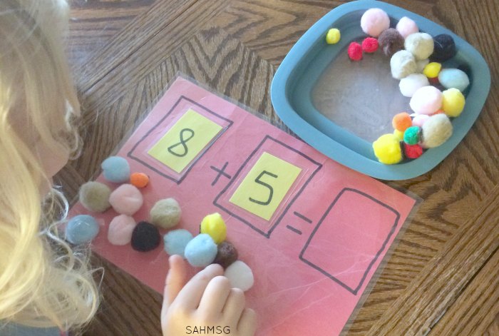 Explore addition with a hands-on addition busy bag for practicing addition concepts, counting and number identification for children in kindergarten or as young as preschool. Adaptations included for younger children.
