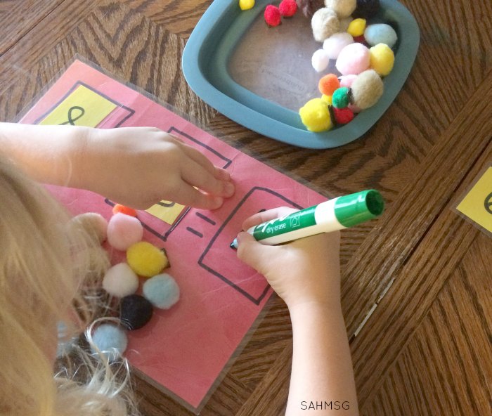 Explore addition with a hands-on addition busy bag for practicing addition concepts, counting and number identification for children in kindergarten or as young as preschool. Adaptations included for younger children.