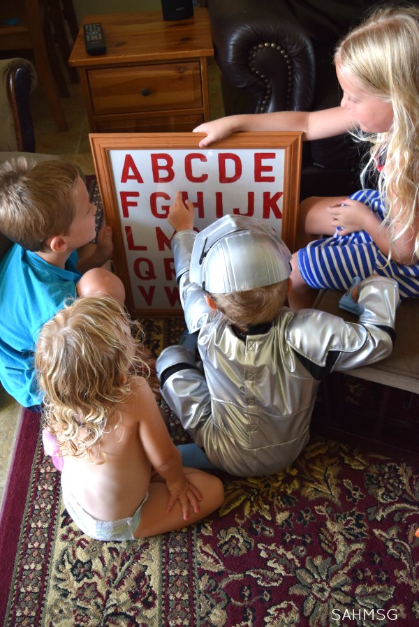 Kids in Socks letter learning activity for preschool. Learn letters with feet! #sponsored