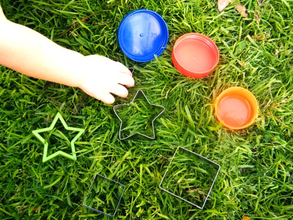 Exploring shapes with sand sensory activity lets kids get their hands dirty while guiding them to learn basic concepts in a hands-on way. So fun for brain breaks outside.