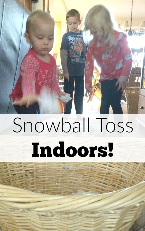 Too cold to play in the snow outside or don't have any snow where you live? Bring the snowball toss indoors for some gross motor fun for babies, toddlers, preschoolers and school age kids. This is so easy to set up with only two supplies. Great for indoor winter fun!