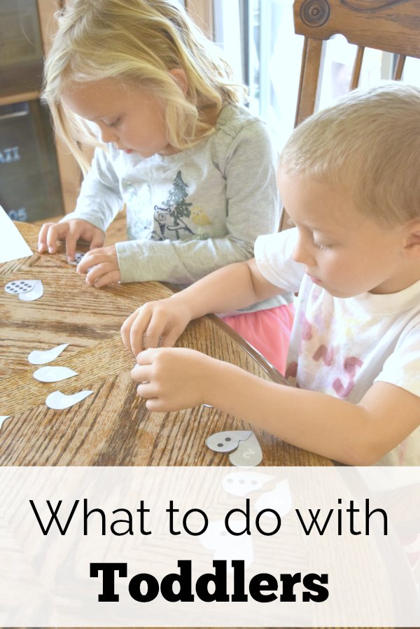 What to do with toddlers while homeschooling. Great activity ideas for toddlers and preschoolers while you are homeschooloing older kids or just need activities for learning at home.
