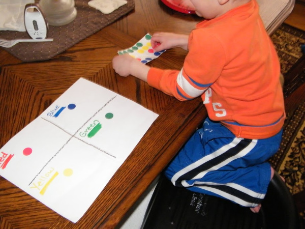 Color sorting and learning activity for preschool age kids that teaches color names, fine motor skills and sorting skills.