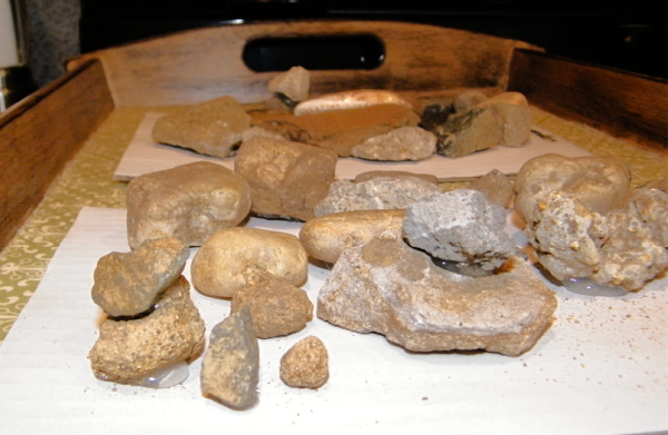 Picture of a kids rock sculpture art in progress.