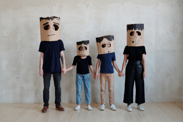 Parents and kids wearing masks title if when kids identify as something they are not.