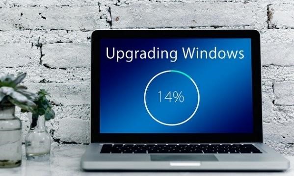 Image of laptop updating. One tip for keeping your home safe from hackers breaking into your smart devices is to keep software up to date.
