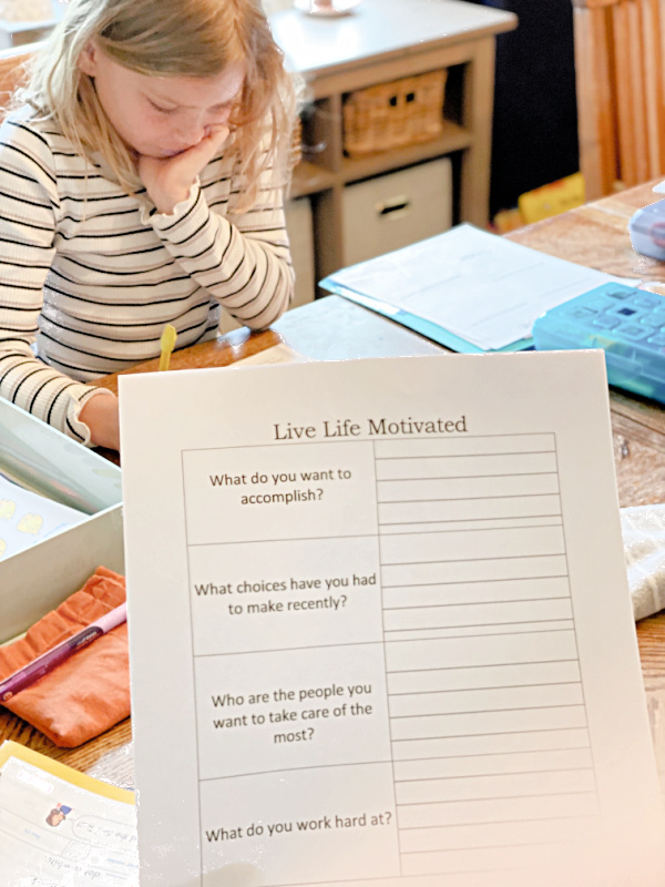 Child working on printable worksheet.