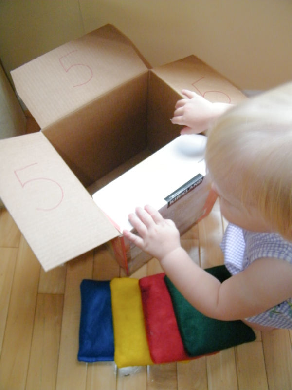 DIY bean bags and bean bag toss game are a fun way to play indoors on rainy days or hot summer days.