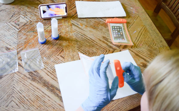 Middle schooler working through the steps to make DIY hot and cold packs in the Generation Genius science kit fit for kids who love science.