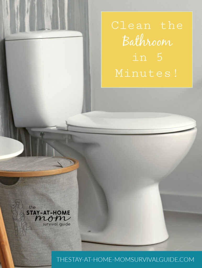 White toilet and gray hamper next to it. Text reads clean the bathroom in five minutes.