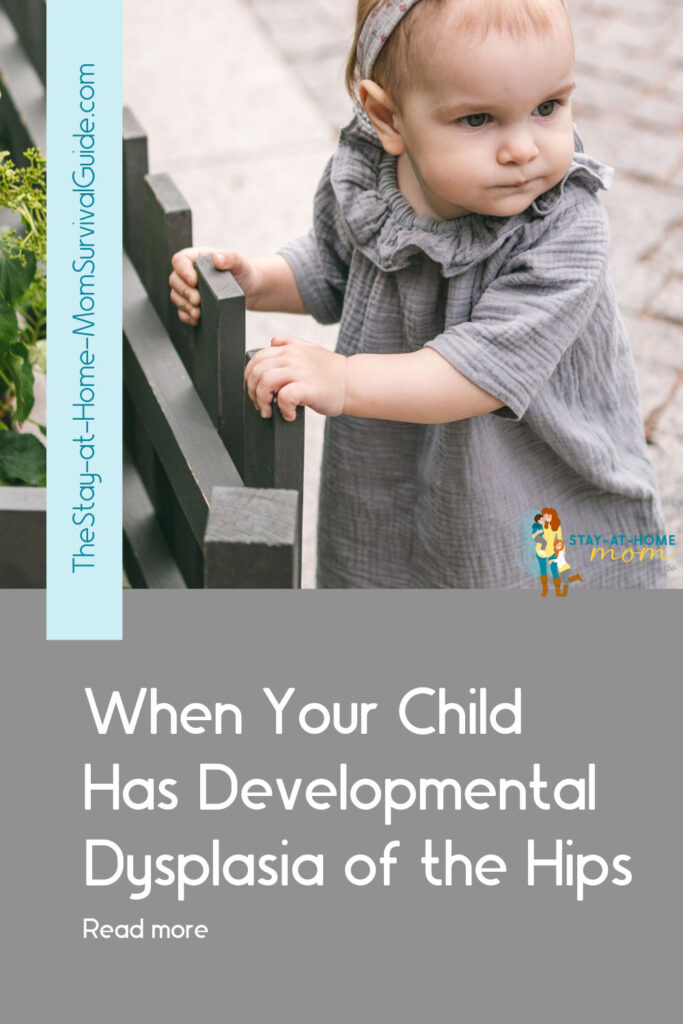 Toddler holding onto fence trying to walk. Text reads when your child has developmental dysplasia of the hips.