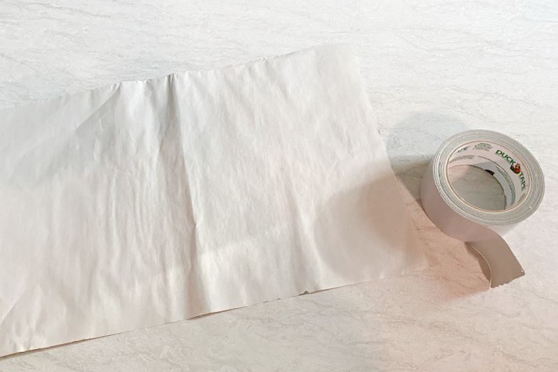 large paper and a roll of duct tape