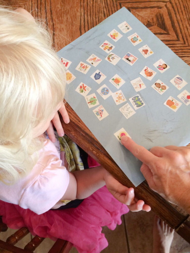 Adult leading the how to count activity with a preschooler.