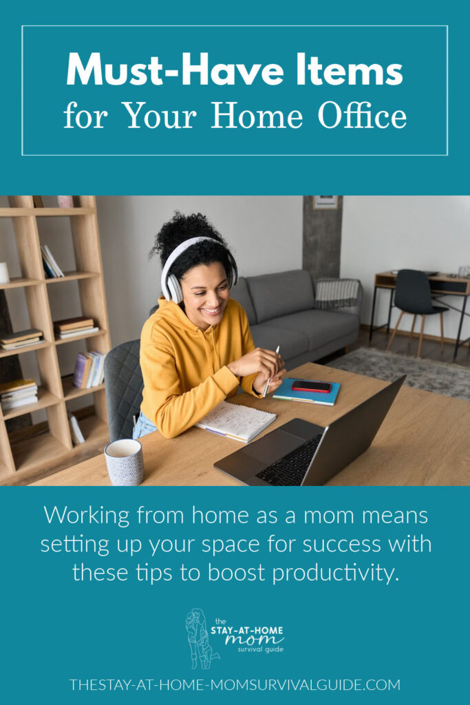 Woman working at home with noise canceling headphones and a laptop. Text reads must-have items for your home office. Working from home as a mom means setting up your space for success with these tips to boost productivity.