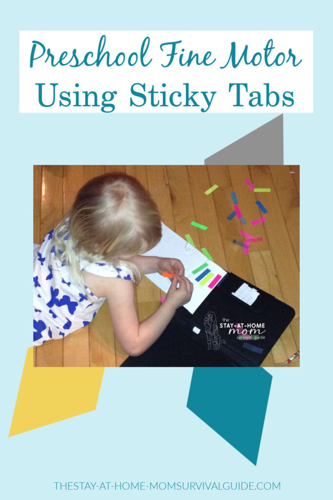 Toddler girl picking sticky tabs off a pile and sticking them to a notebook. Text reads preschool fine motor using sticky tabs.