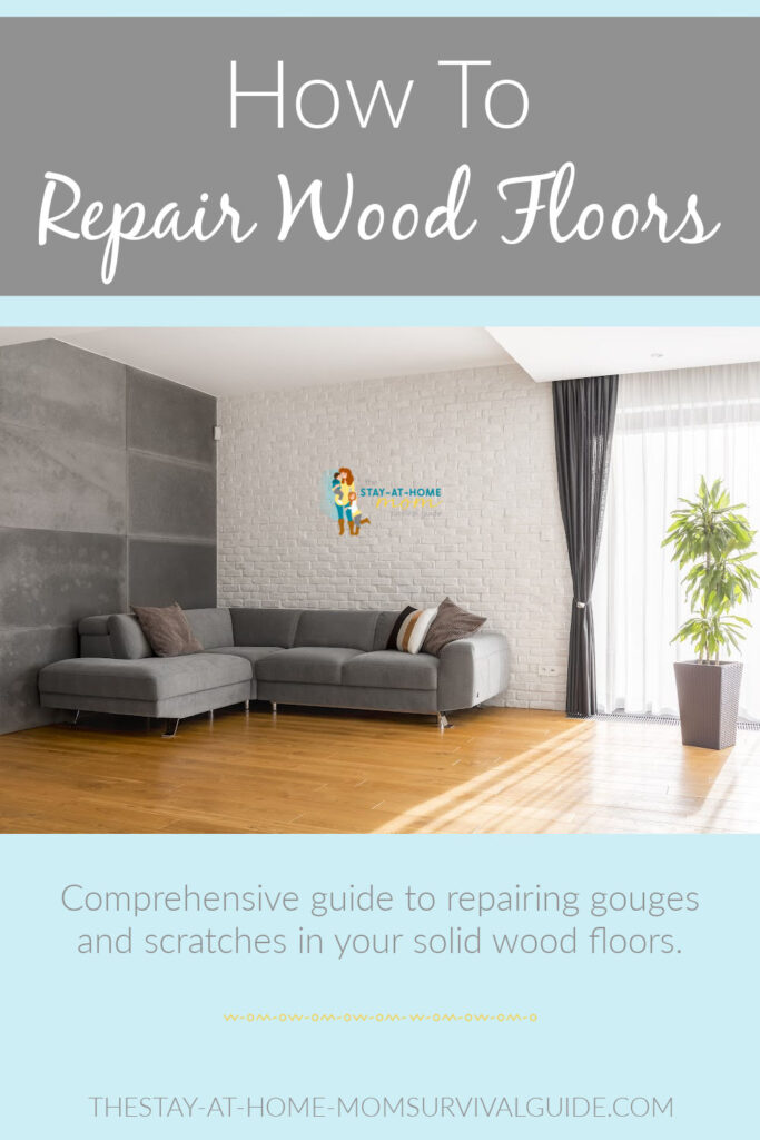 Minimalist living room with a gray couch, plant in front of a window and wood floors. Text reads how to repair wood floors: comprehensive guide to repairing gouges and scratches in your wood floors.