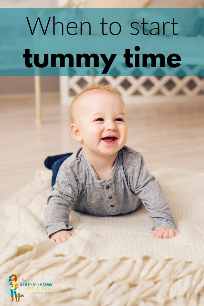 Baby on his tummy smiling. Text reads when to start tummy time.