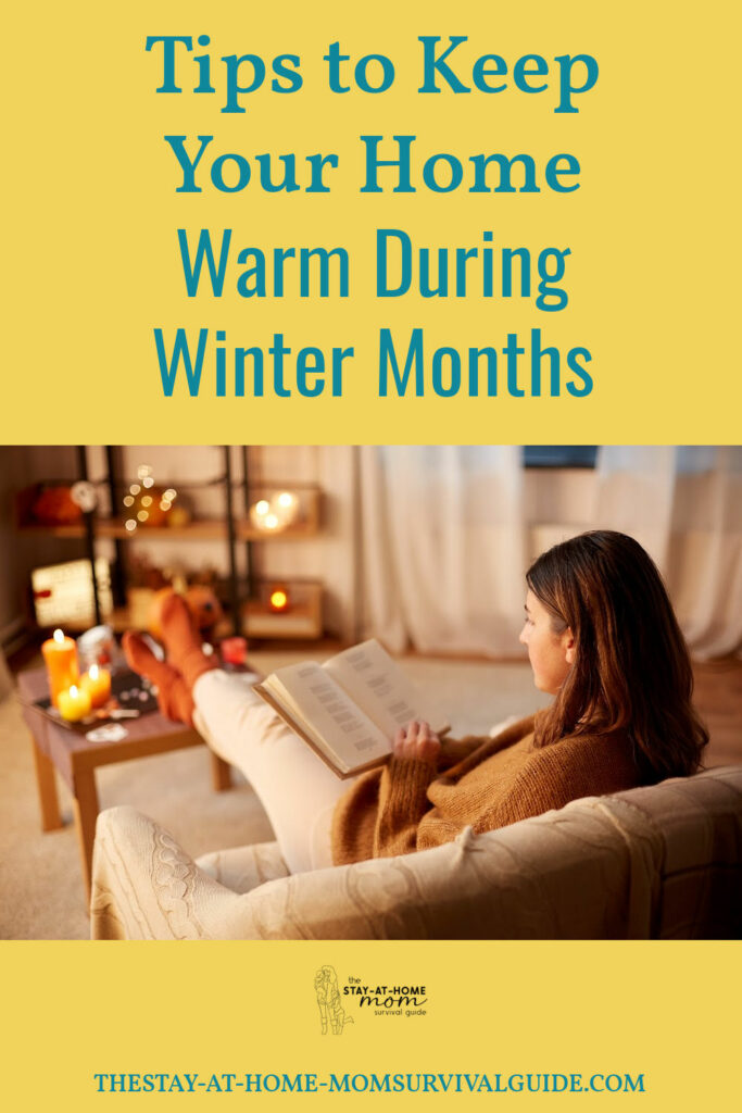 Women seated on a couch in a cozy room with lit candles all around reading a book. Text reads tips to keep your home warm during winter months.