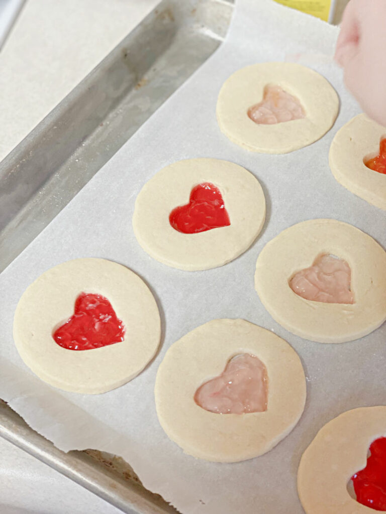 Close up shot of cookies on baking sheet.