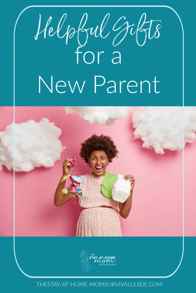 Mother holding diapers and a baby mobile with an excited look on her face. Text reads helpful gifts for a new parent.
