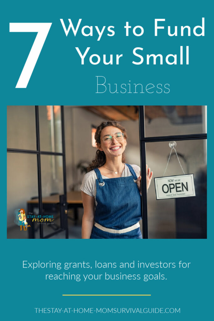 Woman wearing an apron smiling with an open sign next to her hanging on her business window. Text reads 7 ways to fund your small business.